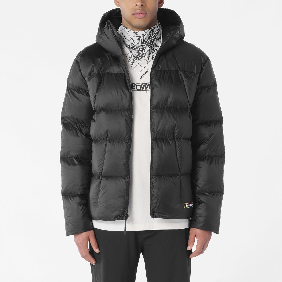 Salomon Outpulse Down jacket showing the DWR ripstop polyamide shell and relaxed fit