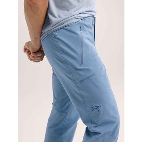 Arc'teryx Gamma Pants in light blue, side view showing the zipped hand pocket and zipped thigh pocket