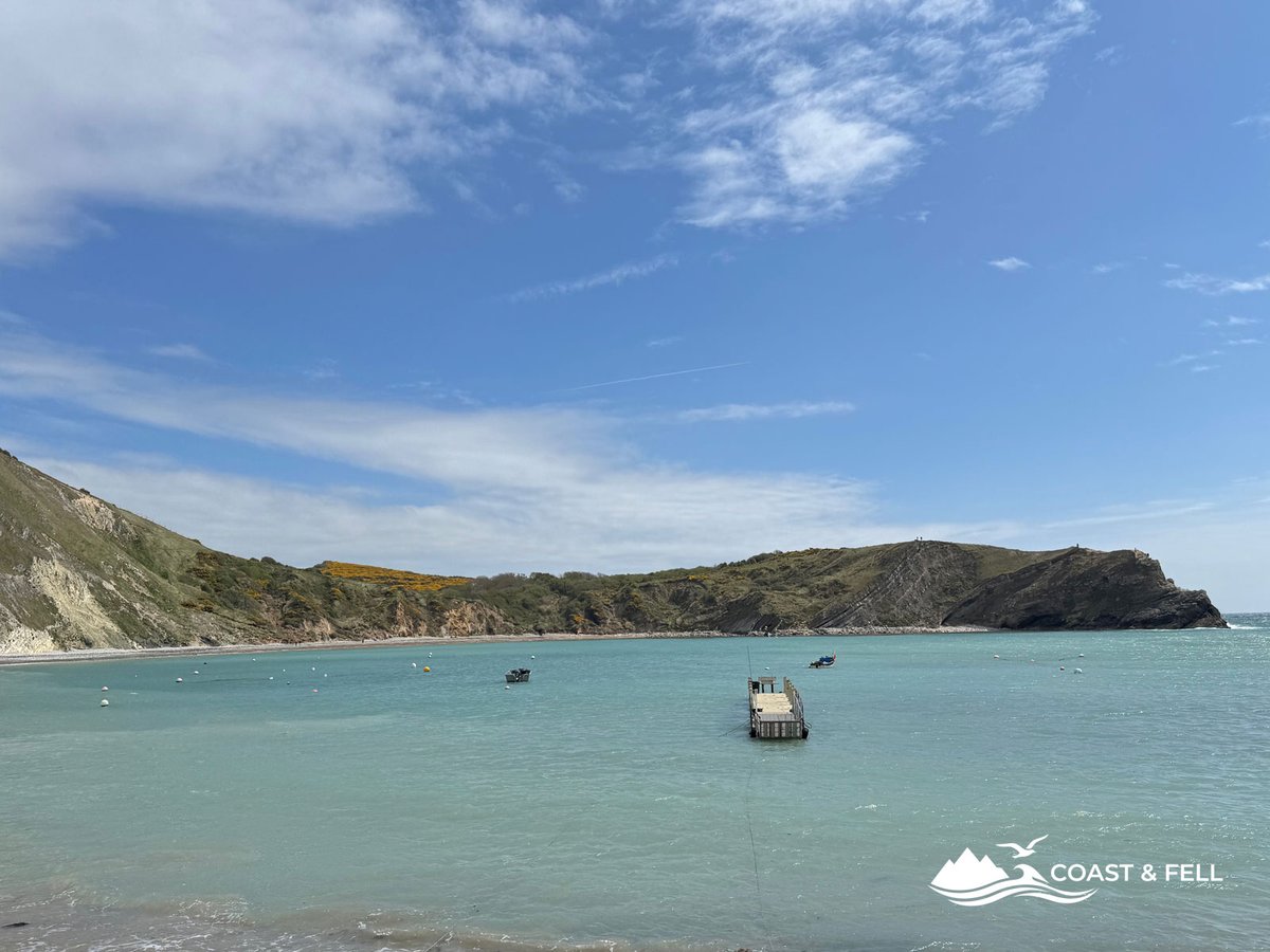 Lulworth Cove horseshoe bay, Dorset, turquoise water and limestone cliffs
