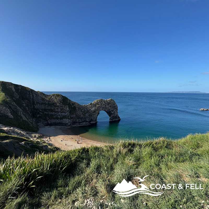 Durdle Door natural limestone arch viewed from the clifftop, Jurassic Coast, Dorset
