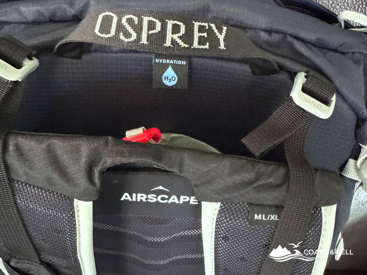 Osprey Talon 33 hydration sleeve showing H2O label and AirScape panel