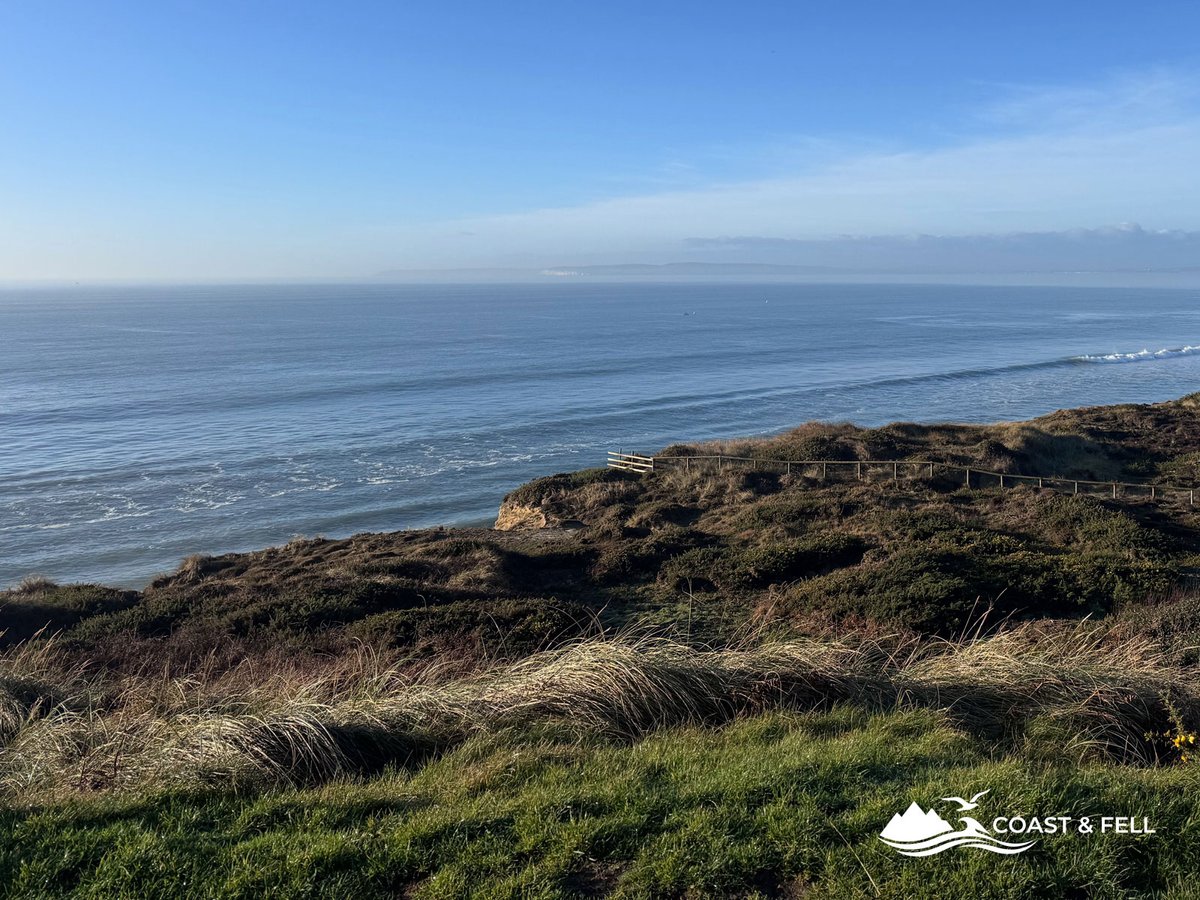 Looking west from Hengistbury Head over the heathland toward Bournemouth on a clear December morning