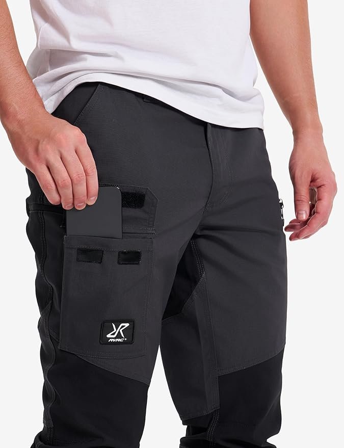 RevolutionRace Nordwand Outdoor Trousers in anthracite showing polycotton canvas construction and stretch panels