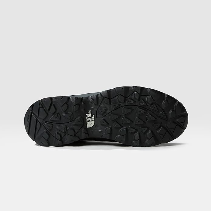 The North Face Hedgehog 3 outsole showing the SURFACE CTRL multi-directional lug pattern
