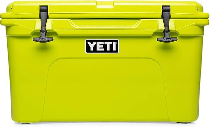 YETI Tundra 45 rotomoulded cool box in chartreuse with T-Rex lid latches and dry goods basket