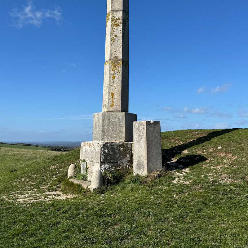 The Swanage Water Act Obelisk, a hexagonal granite column on the Ballard Down ridge