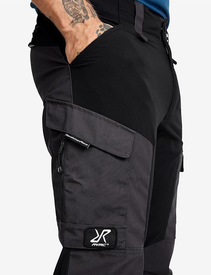 RevolutionRace RVRC GP Trousers in dark olive showing seven pockets and polycotton canvas with stretch panels