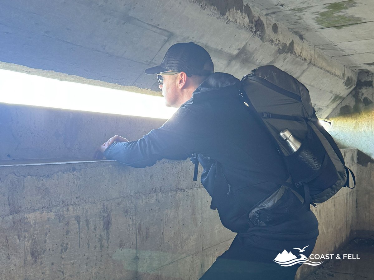 Wearing the Pinnacle 28 inside Fort Henry, looking out through the observation slit over Studland Bay
