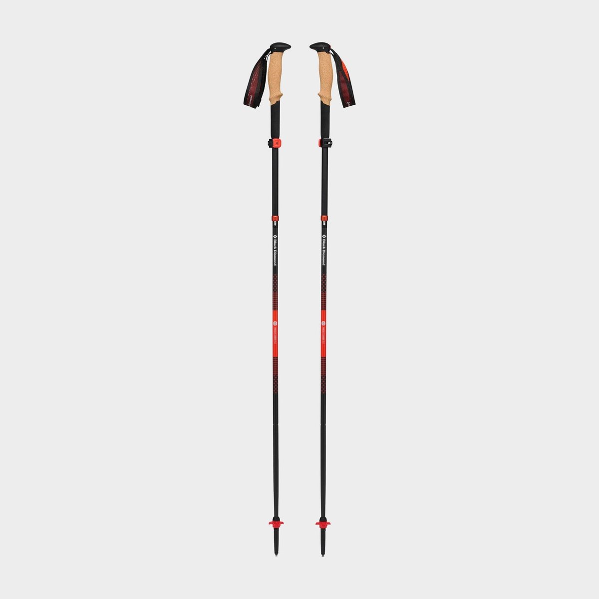 Black Diamond Pursuit Carbon FLZ folding trekking poles in octane orange with cork grip, the carbon flagship